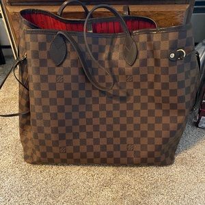 Authentic Luis Vuitton Never Full